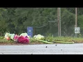 Neighbors and bystanders leave flowers for murdered Coos Bay woman