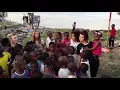 Word Up! Little Mix singing in Liberia