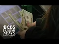 Majority of Americans not satisfied with U S economy CBS News poll finds