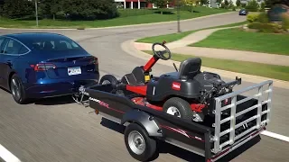 A CargoMax Pulled by a Tesla
