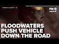 WATCH Floodwaters push vehicle down Hawaii road during Tropical Storm Lala
