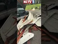 Neighbors in KC found winds toppled a rain roof onto their cars