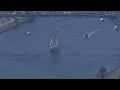 Ships traverse the Cape Cod canal en route to Sail Boston