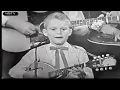 Ricky Skaggs,  " Ruby, Ruby honey, are you mad at your man?"