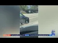 Download Lagu Wild video shows woman driving on Orange County freeway with 3 wheels, sparks flying