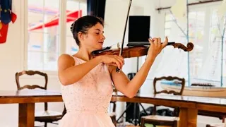 Solo sailor female traveling musician. Happy days on buoy in Les Saintes.