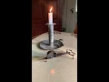 Using an 18th century candle wick trimmer and snuffer