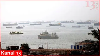 View of vessels at anchor in Strait of Hormuz off Iran port city