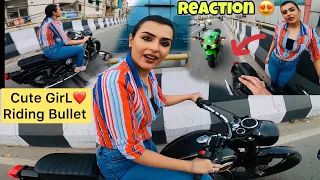 cute girl riding bullet on road