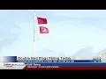 Double Red Flags Flying