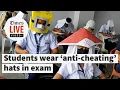 Download Lagu Students wear anti-cheating hats in the Philippines during exam