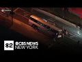 NJ Transit bus gets stuck on road divider in Jersey City