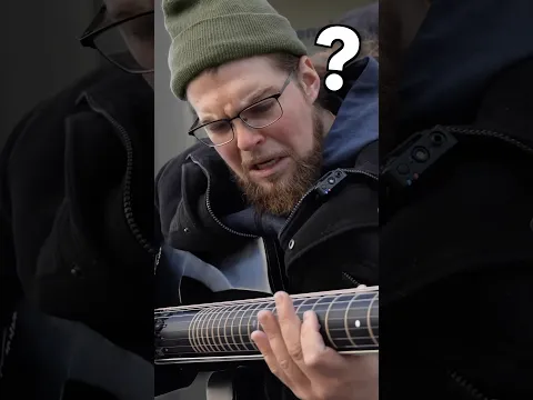 Street musician can’t believe the guitar I just handed him
