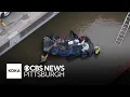 Man dies after vehicle flips over into Pittsburgh-area creek