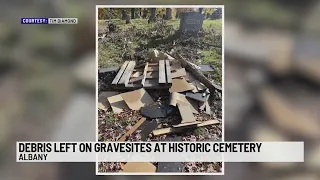 Debris left on gravesites at historic cemetery
