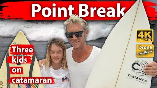 Point Brake. Surfers Ilya Escario and Susan with three kids on catamaran Nautitech 46, Kilauea.