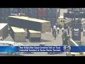 Police Man Dies After Shipping Container Falls Onto Pickup Truck In Industrial Accident