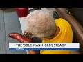 Sole-man laces up in fight to keep business running