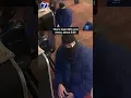 shows man sawing into game machine at Omaha laundromat