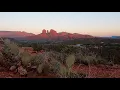Sunset and moonrise over Cathedral Rock in Sedona AZ
