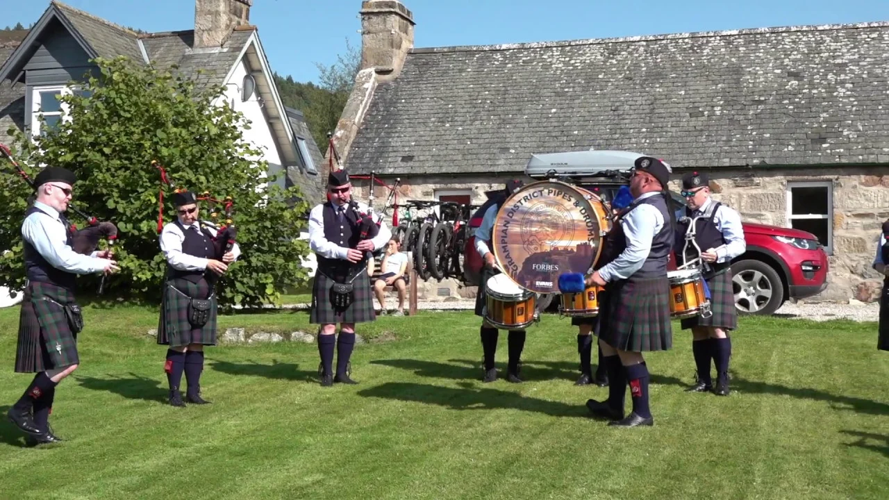 'Mairi's Wedding' & 'Barren Rocks of Aden' played by Grampian District Pipes and Drums in Braemar 'Mairi's Wedding' & 'Barren Rocks of Aden' played by Grampian District Pipes and Drums in Braemar