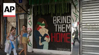 Israelis talk about enduring pain and hope as Hamas war stretches into second year
