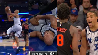 Jalen Suggs carried off with knee injury then OG and Bane have words after foul