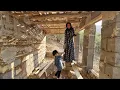 Download Lagu Starting the day with hope: Grandma struggles to strengthen the roof of her house