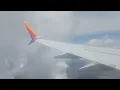 SWA WN2810 N8541W 737-8H4 hitting big turbulence in the clouds while final descend for Chicago