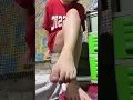 Asian girl in t-shirt and panties morning tease cross leg pose