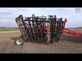 Germinator / cultivator work on plowed soil. Case tractor with 5 m width germinator. 40T.