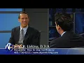 Dr. Licking DDS discussing tooth decay with Randy Alvarez.