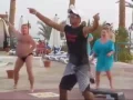 Fat Russian guy dancing in speedo