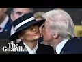 Melania s hat stops Donald Trump kissing her at inauguration ceremony