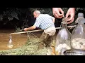 Download Lagu Fishing in the river with a glass bottle. Old funnel traps are now banned