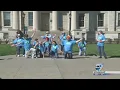 Senior citizens dance in flash mob