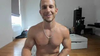 Muscle Cashmaster God with leather gloves and whip