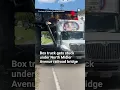 Box truck gets stuck under bridge in DeWitt N Y