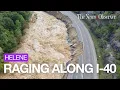 Watch the raging Pigeon River wash away I-40 after Helene