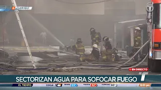 Bomberos realizan labores de extinción de incendio que ha afectado varios locales en David