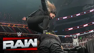 seth rollins stomps roman reigns after an intense war of words turns chaotic raw highlights