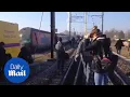 Download Lagu Footage shows aftermath as two trains smash into each other - Daily Mail