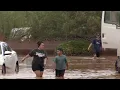 Neighbors help each other clean up after extreme flooding in southern Utah