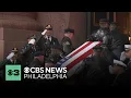 Procession for Officer Andy Chan arrives at Cathedral Basilica of Saints Peter and Paul