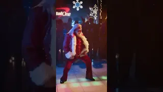 John Travolta as Santa Claus in new commecial called Holiday Night Fever