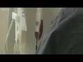 Medic taking blood plasma donations