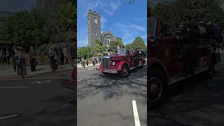 Cos Cob fire truck leaving church with the casket after Mass of Christian Burial for George Hannigan