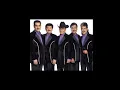 Los Tigres Del Norte - La Mesa Del Rincón Letra Lyrics
