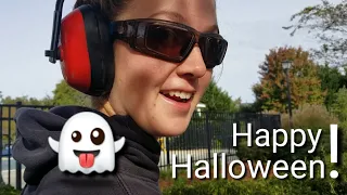 Woman Landscaper Pruning Shrubs