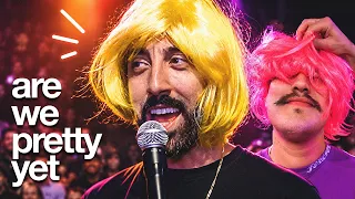Babe come look it's that guy who sings with the autotune microphone he's wearing a wig in this one